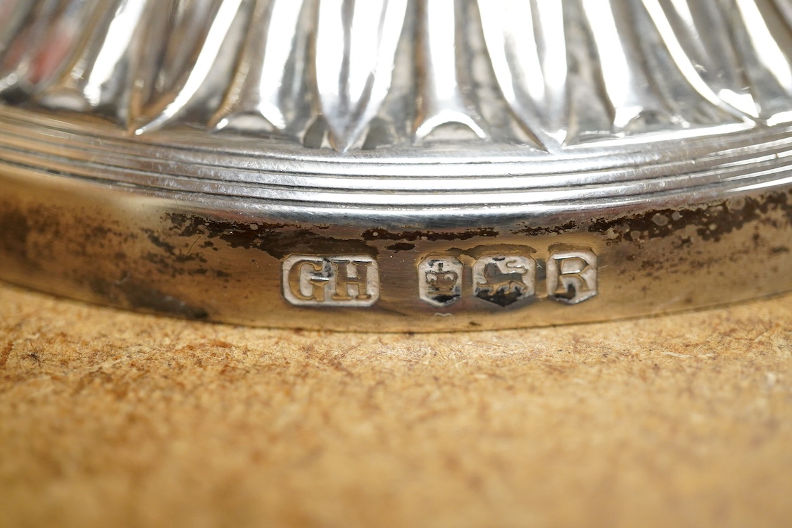 A pair of Elizabeth II silver mounted two branch, three light dwarf candelabra, by George Howson, Sheffield, 1959, height 16.7cm, weighted.